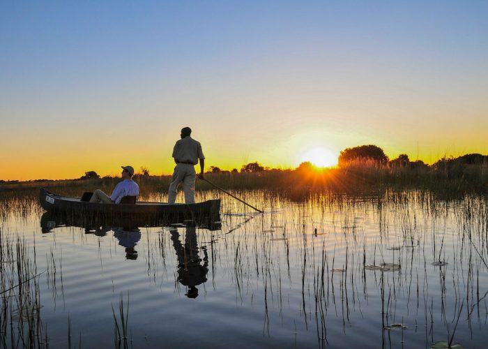 Okavango,Delta,,Botswana,,South,Africa,,May,25,,2011.,Three,Men